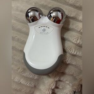 NuFace Handheld Microcurrent Facial Toning Device in White and Silver